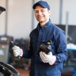 Mechanic working on a Mazda service appointment