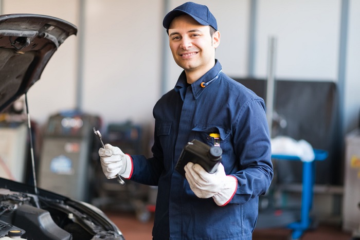 Mechanic working on a Mazda service appointment