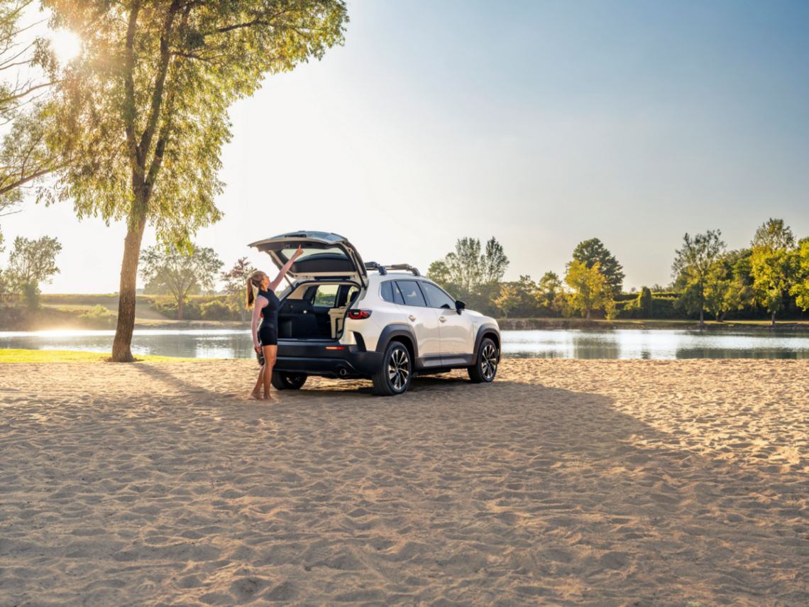 The 2026 Mazda CX-50 parked near a pond